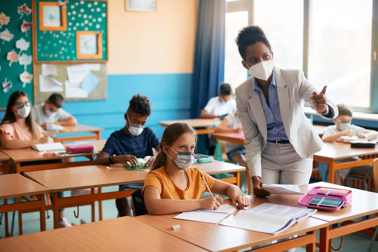 classroom full of students wearing masks